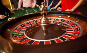 Live Bandar Poker table interface on ohtogel rtp showing player seats and card display
